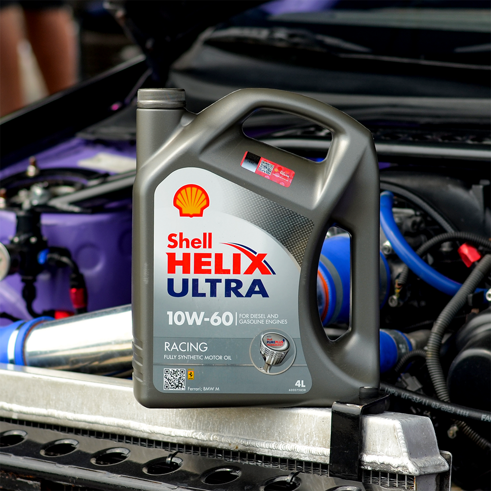 Моторна олива Shell Helix Ultra Racing 10W-60, 4 л — каністра на авто